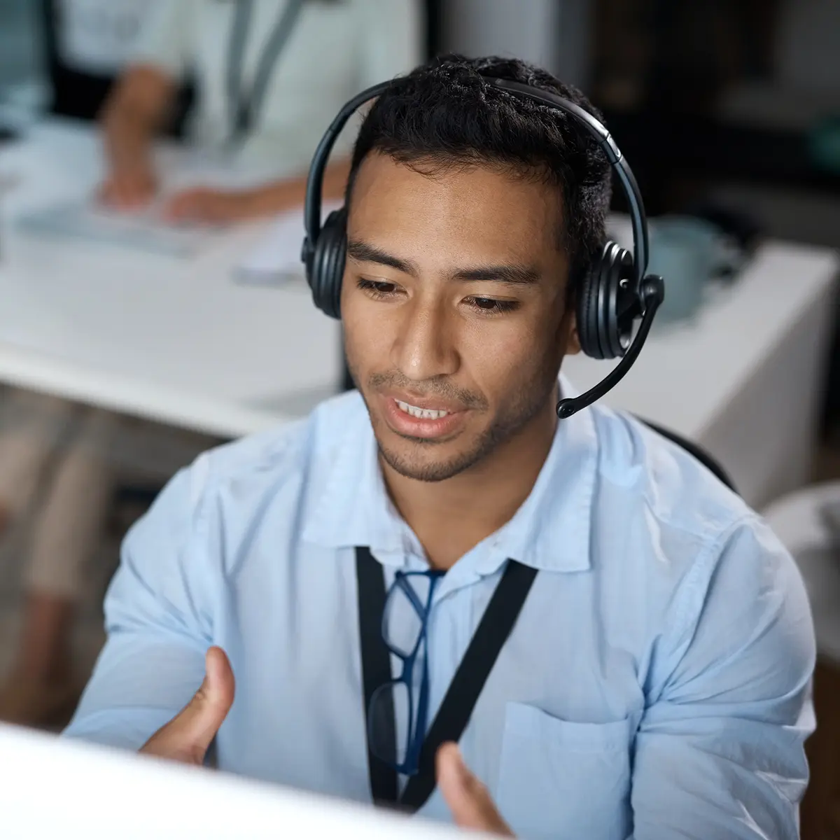 An InfinIT technician providing hands-on IT assistance at a Youngstown facility.
