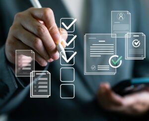 Business professional reviewing PCI HIPAA ISO compliance checklist documentation for managed IT services